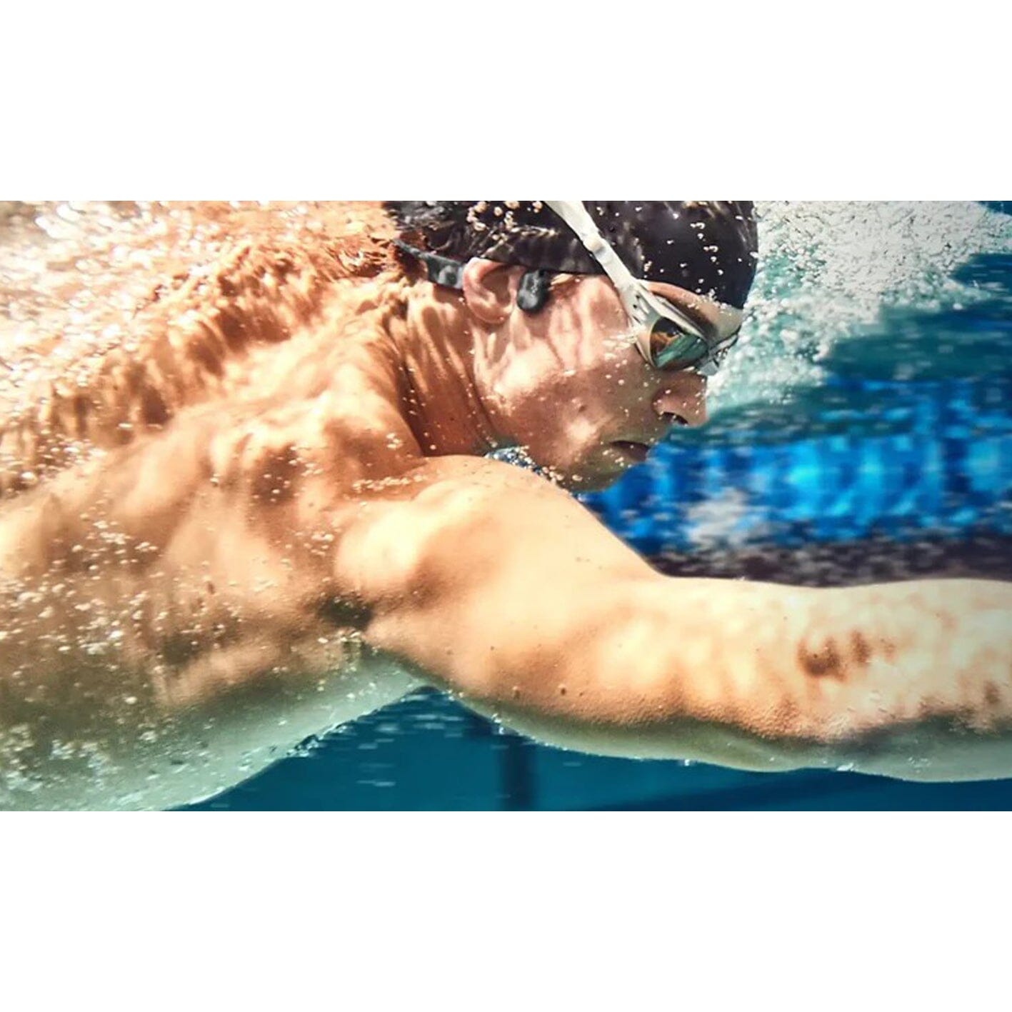 I've been swimming with the Shokz Openswim headphones — and they've  revolutionized my workouts